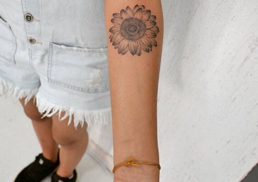 Small Sunflower Tattoo Near The Inner Elbow