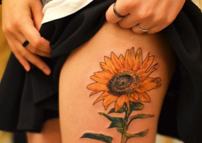 Sunflower Tattoo On The Thigh For Girls